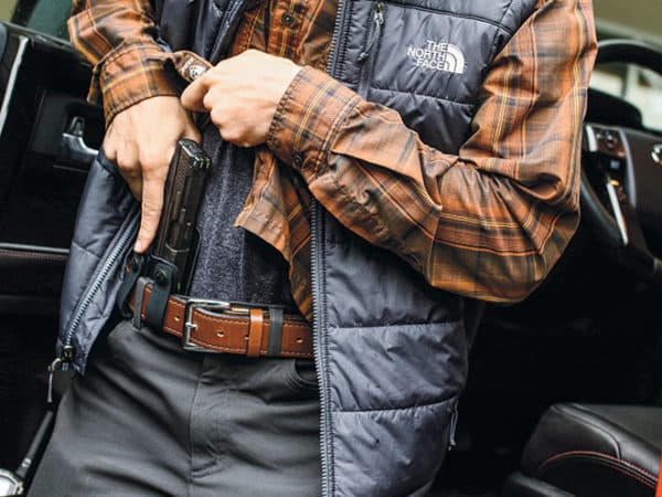 Man Drawing Gun from appendix carry