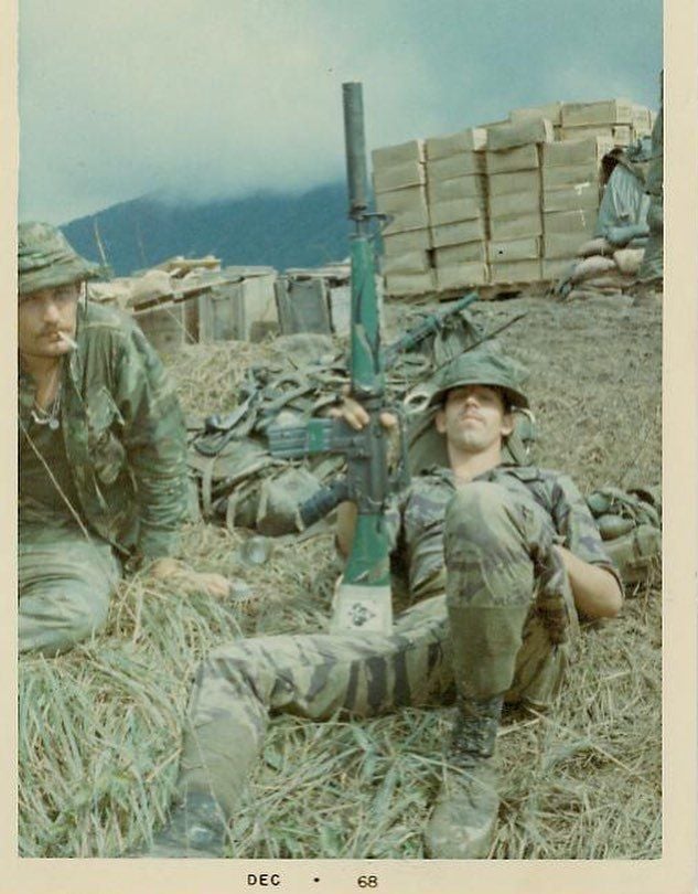 Photo of soldier holding Colt 605 with suppressor, Vietnam 1968