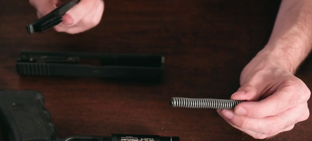 Brush the recoil spring and guide rod