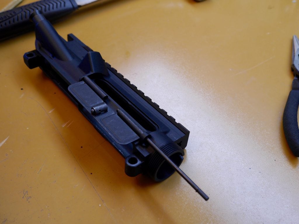 Slide Hinge Pin onto Upper Receiver