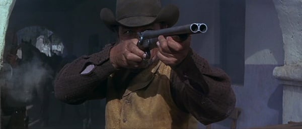 Pepper with his coach gun in Chisum film