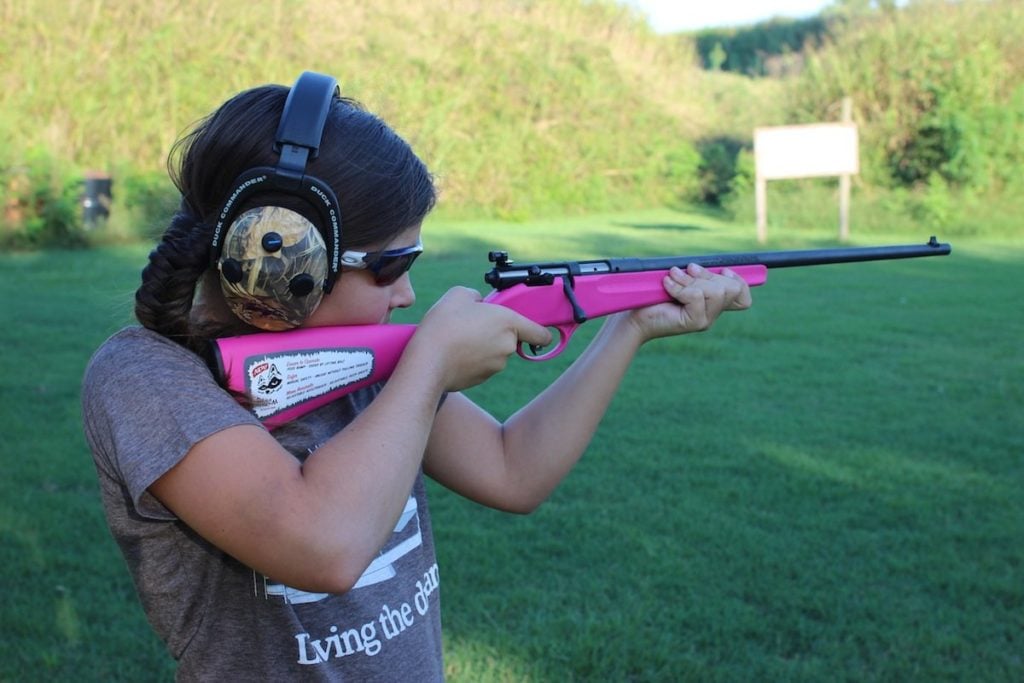 Girl shooting .22 rifle