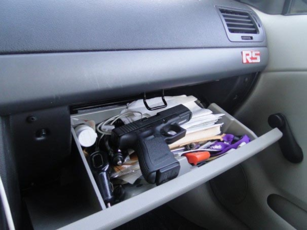 Glock pistol in glove compartment