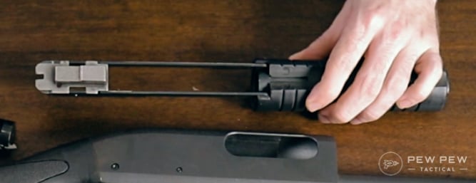 Bolt carrier into notches on rails