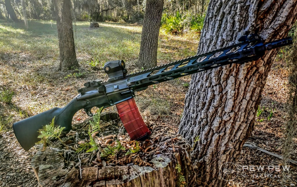 Ares SCR leaning on trees