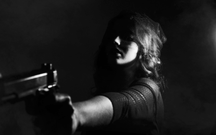 Girl Holding Gun 