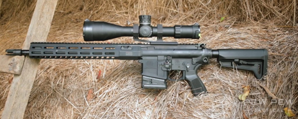 Sig Sauer 716i Tread AR-10 asleep in the hay