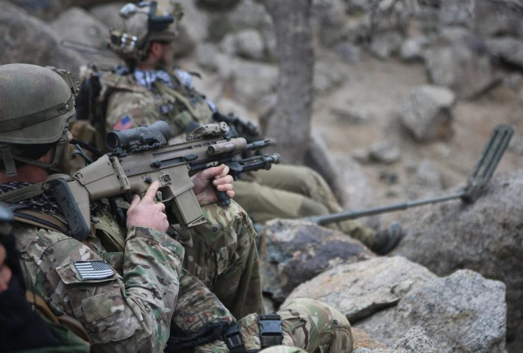 MK17 Special Forces on patrol in the mountains of Afghanistan