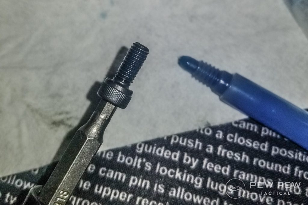 Applying blue loctite to mounting screws