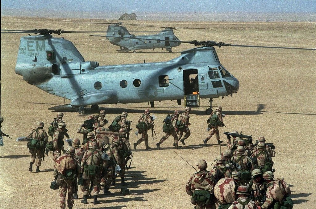 Marines board a Chinook helicopter during the Gulf War, 1991