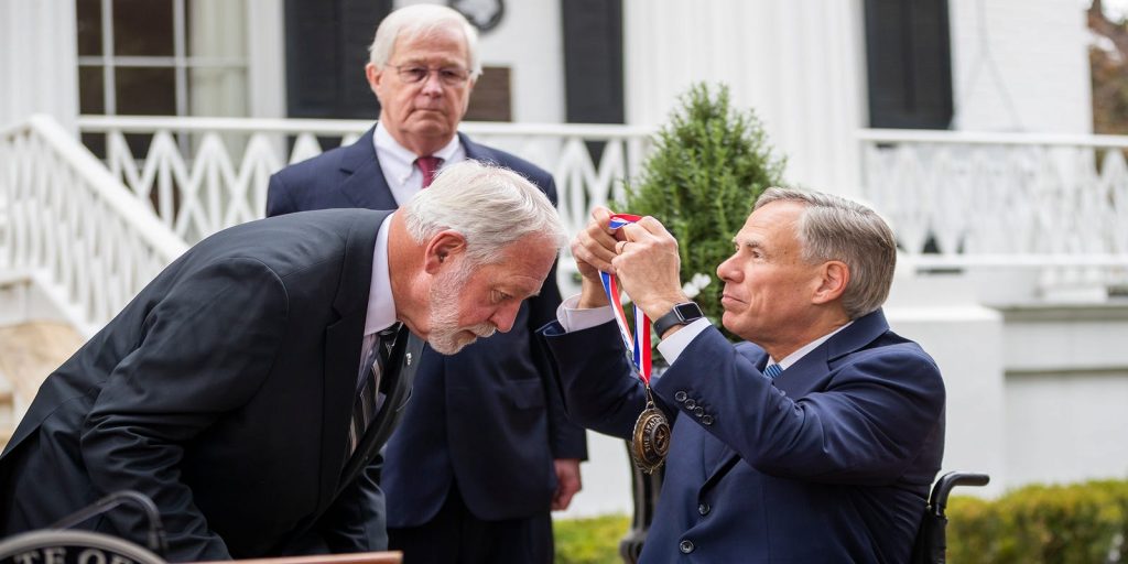 Jack Wilson Governor Presenting Medal