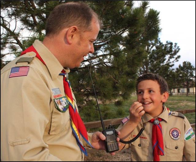 Scout using a radio (K2BSA)