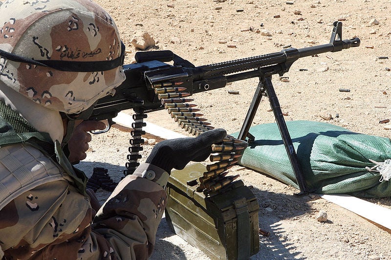 Iraqi soldier shooting a PKM