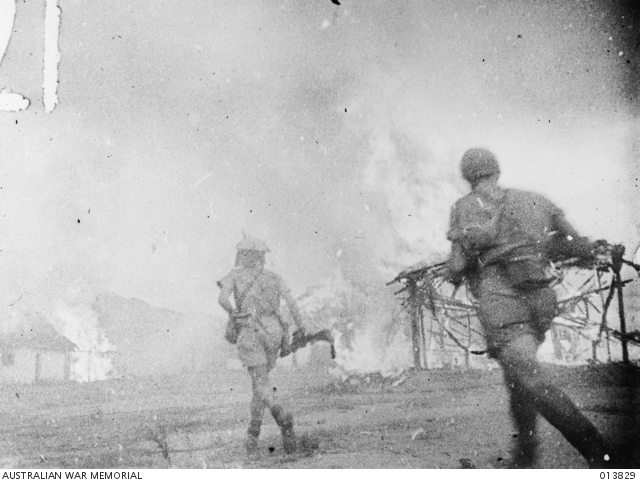 Village in Timor, Mindello, burning