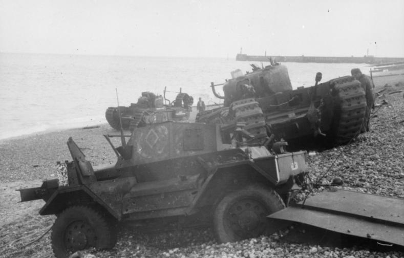 Churchill tanks and a Daimler Dingo stuck in the sand at Dieppe