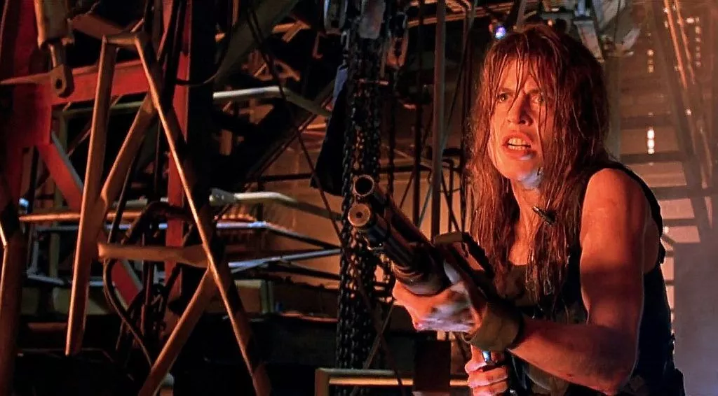 Linda Hamilton as Sarah Connor with her Remington 870