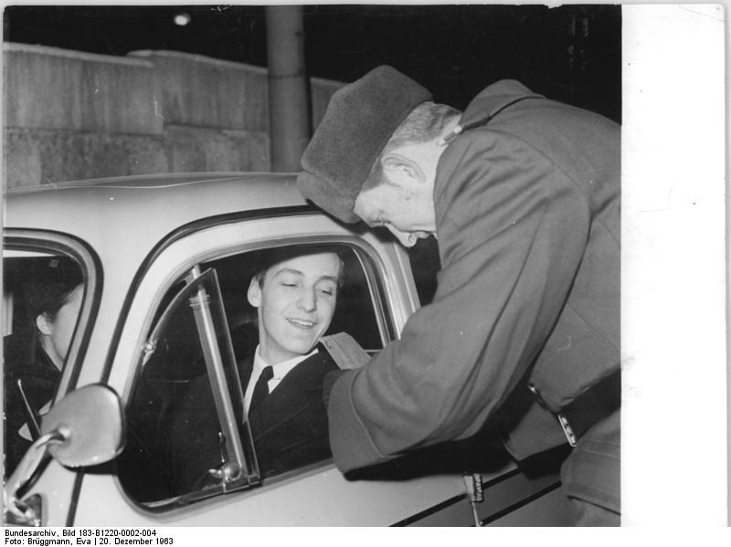 Documents being examined at a checkpoint into East Berlin