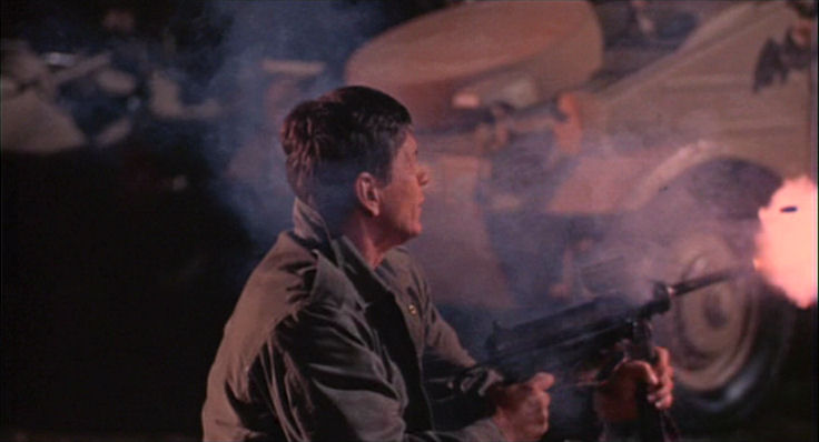 Joseph Wladislaw (Charles Bronson) fires at a German sniper