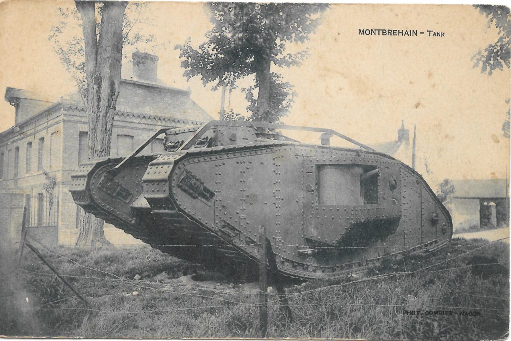 Photo of an English tank destroyed during the Battle of Montbrehain on a postcard